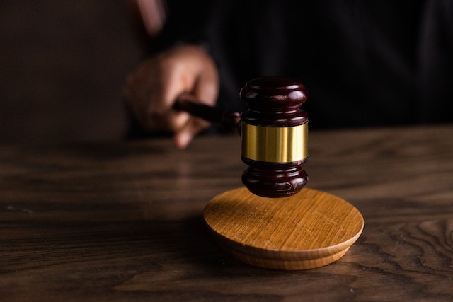 a wooden gavel in small claims court